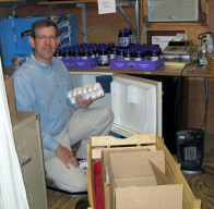 Image of volunteer stocking inventory