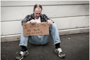 Photo of man with sign