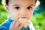 Image of child eating a cookie