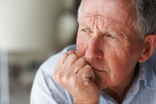 Image of elderly man with worried expression